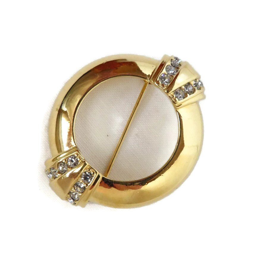 AVON Gold Tone Rhinestone Studded Circle Pin