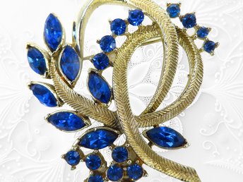 Coro Blue Rhinestone Gold Tone Flower Brooch